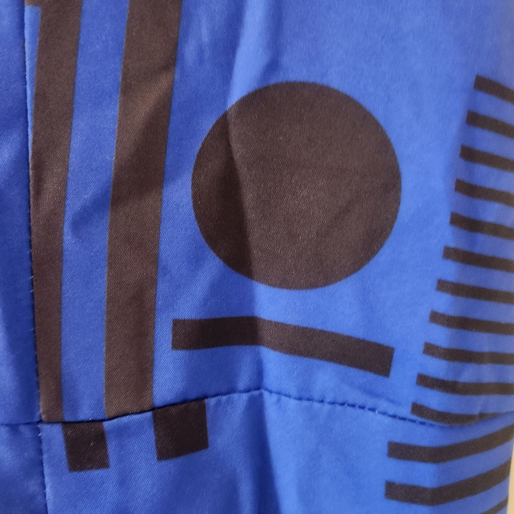 Nice Fashion blue and black jumpsuit. Patterns have circles and stripes. - Picture 6 of 10